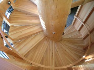 Circling staircase made from a salvaged Sitka spruce on the property.